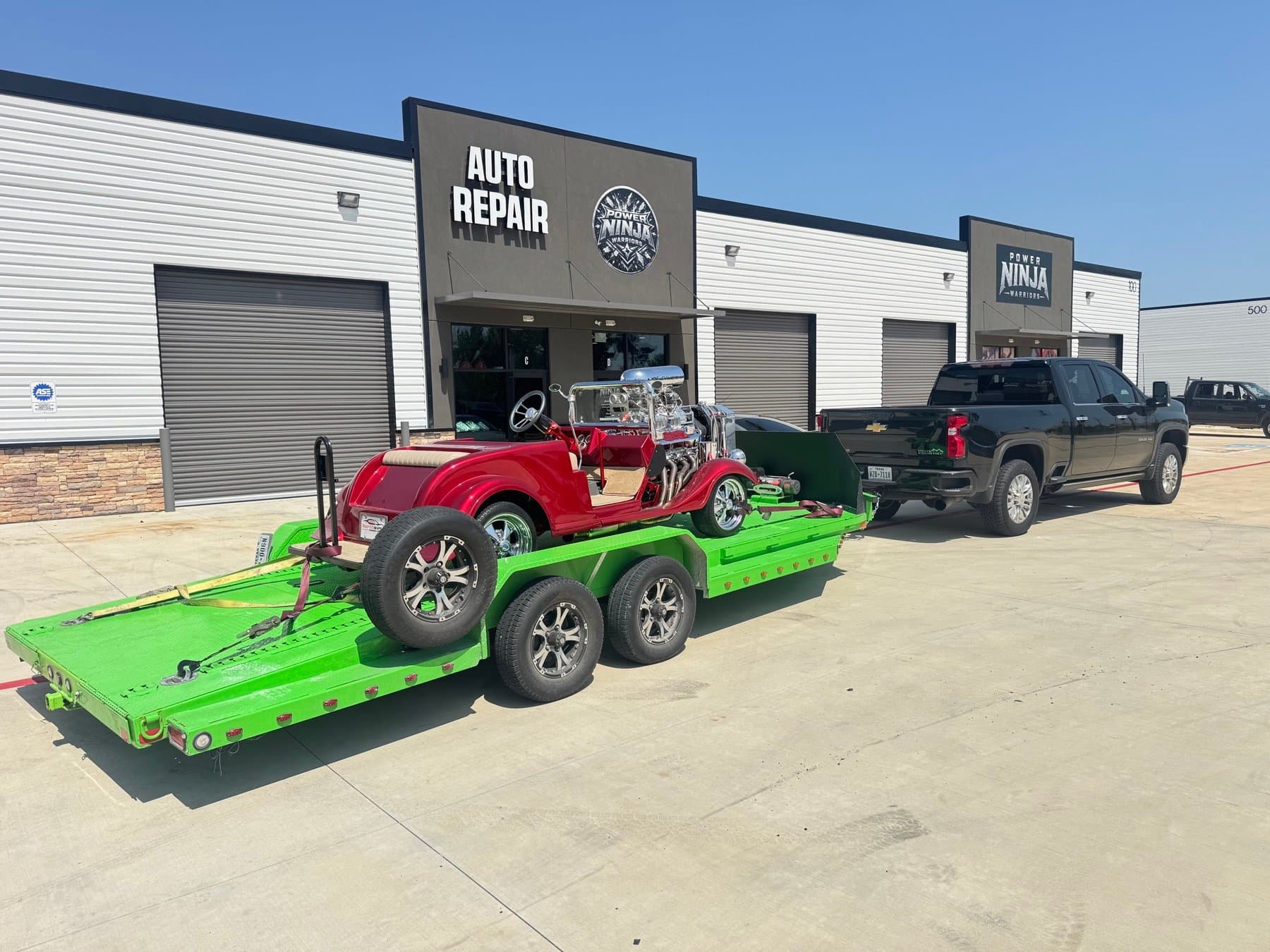 Blown hot rod roadster loaded on the trailer